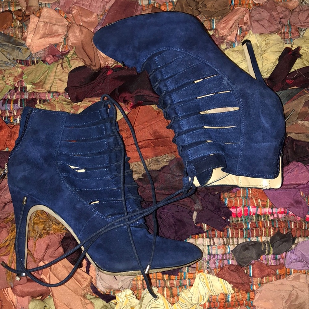Cobalt blue lace up booties.